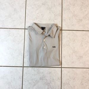 light grey shirt-sleeved patagonia polo